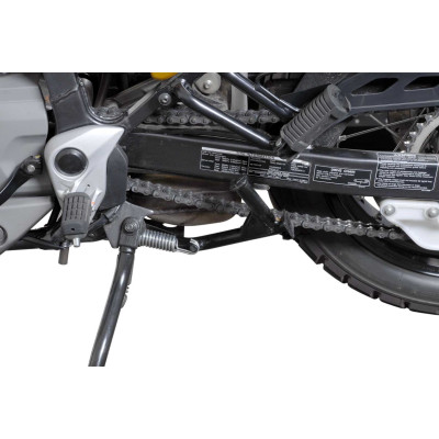 Středový stojan\r\n\r\nNezničitelná, ale lehká konstrukce z ocelových trubek nabízí nejlepší úhel a světlou výšku, usnadňuje zve