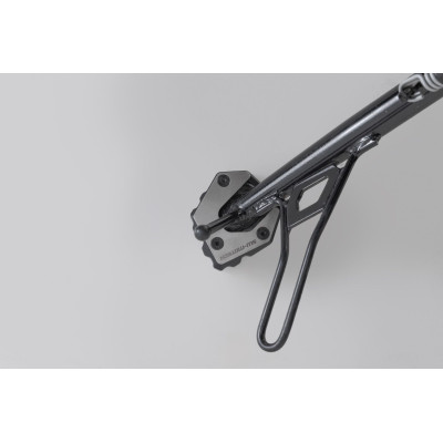 Nástavec pro nohu bočního stojanuTento nástavec patky byl vyvinut speciálně pro boční stojan modelu Moto Guzzi V85 TT.Tento odol